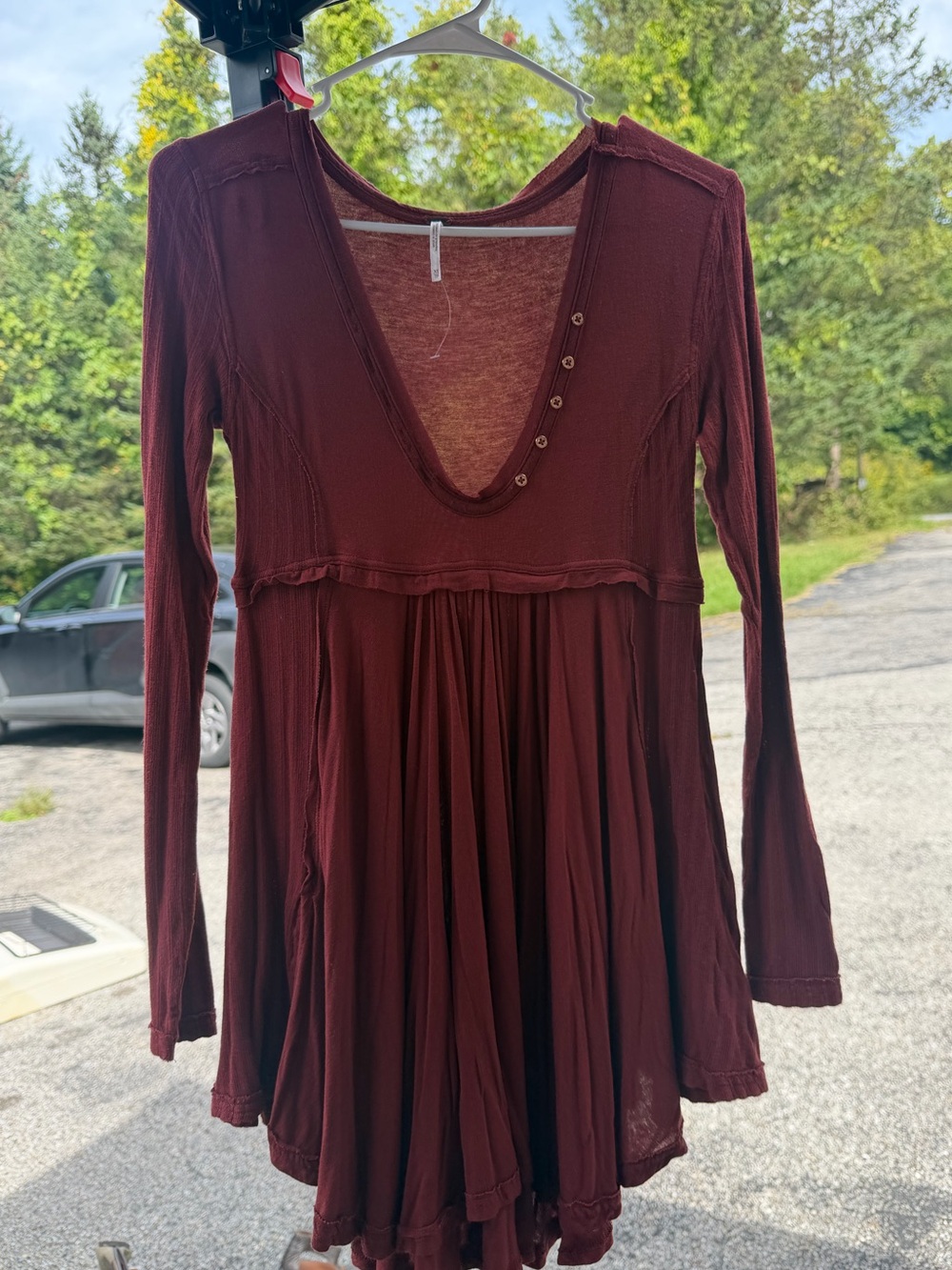 Free people brick rust colored baby doll tunic top size XS oversized and stretch
